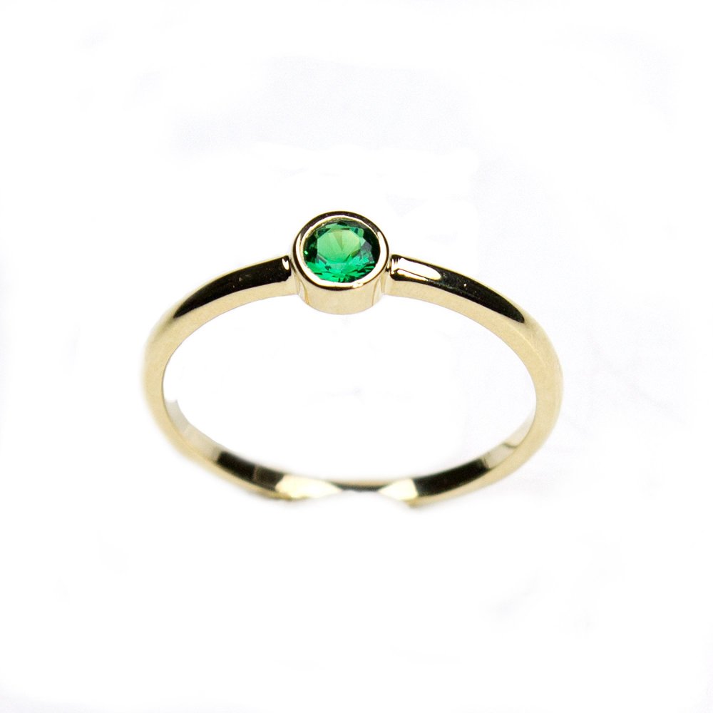 Χρυσό δαχτυλίδι Κ9 με πράσινο ζιργκόν