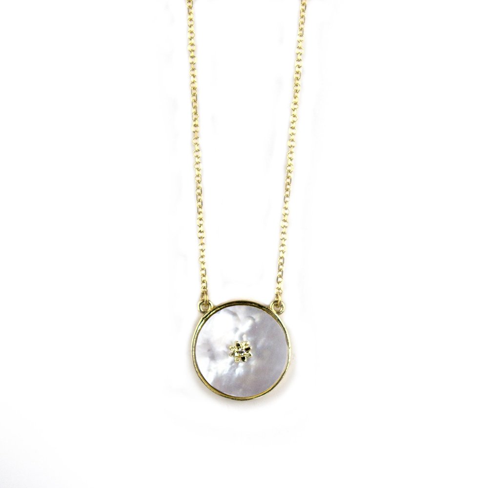 K9 gold necklace with mother-of-pearl and white zircon