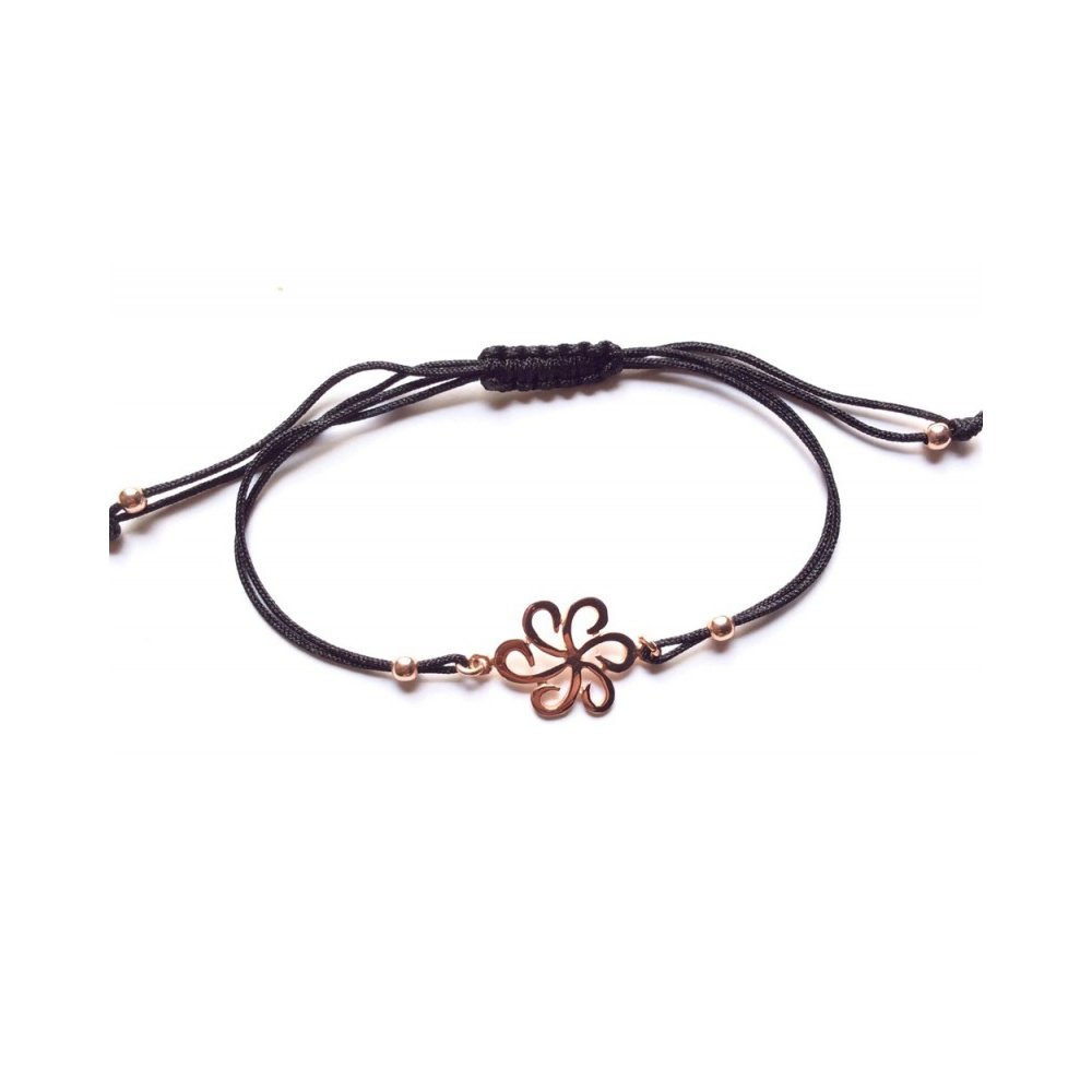 Silver bracelet with brown cord and daisy motif