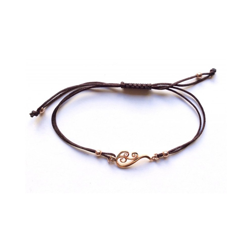 Silver bracelet with brown cord