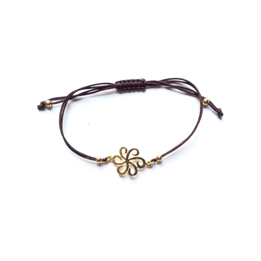 Silver bracelet with brown cord and daisy motif