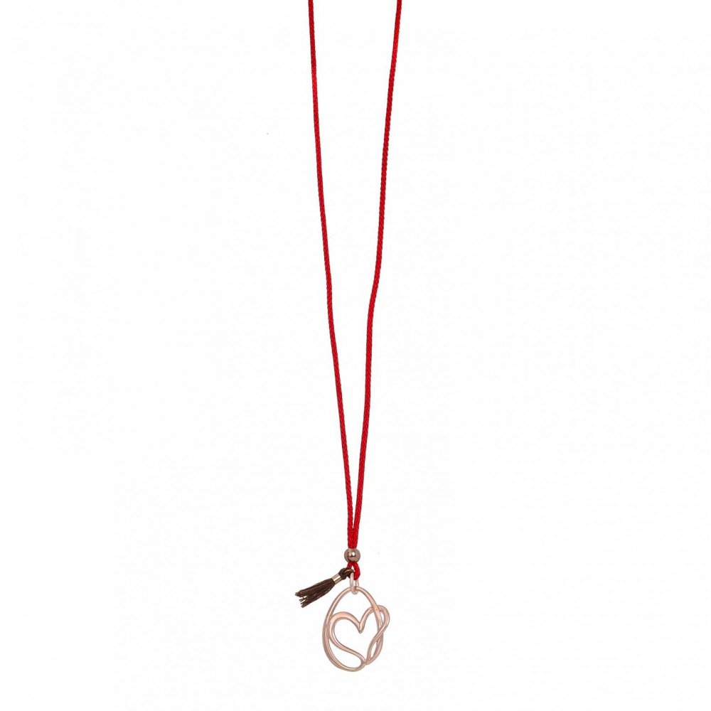 Silver heart necklace with red cord and brown tassel